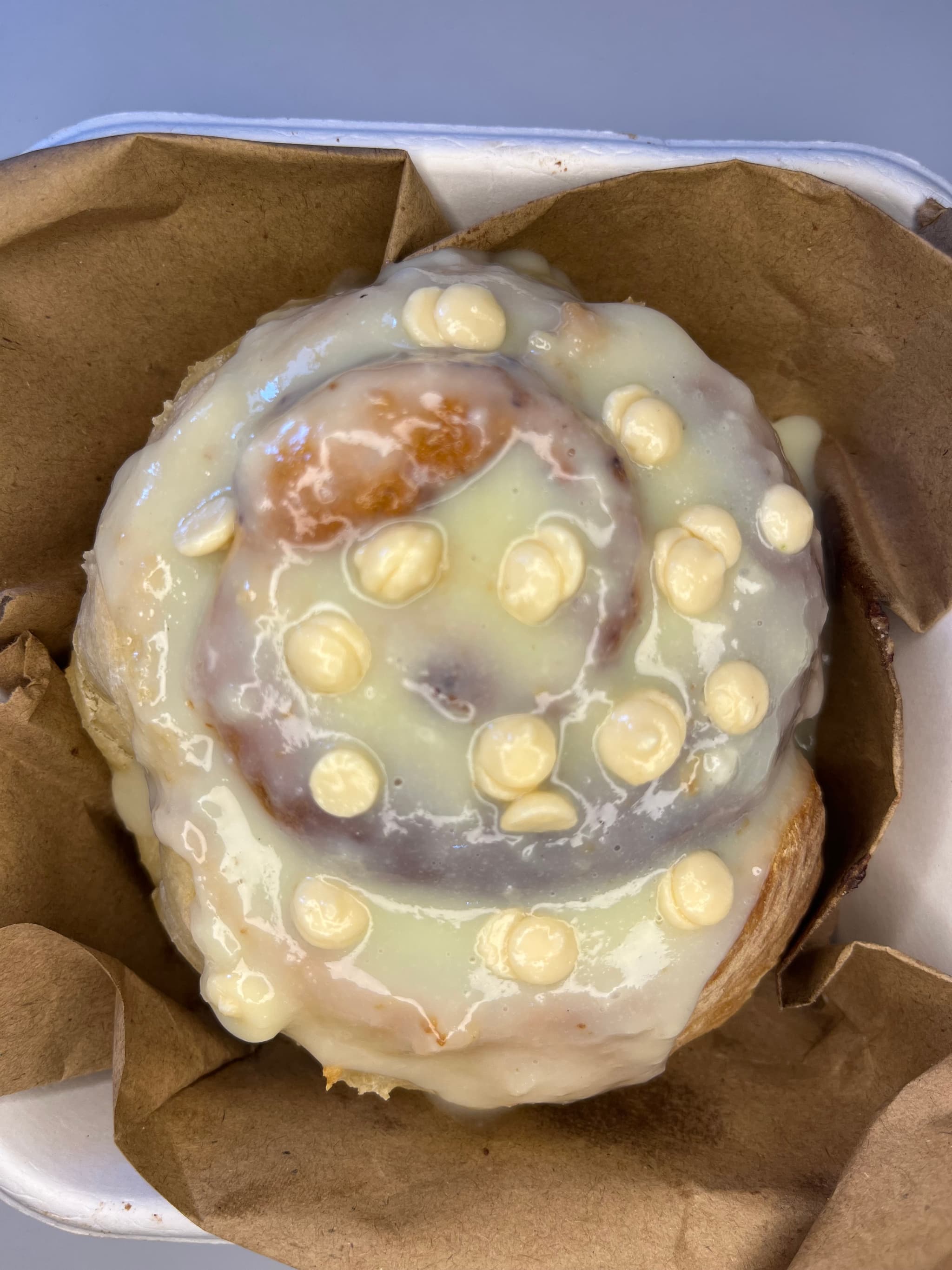 white chocolate glazed cinnamon roll