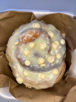 white chocolate glazed cinnamon roll