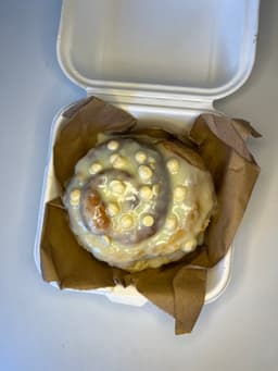 white chocolate glazed cinnamon roll